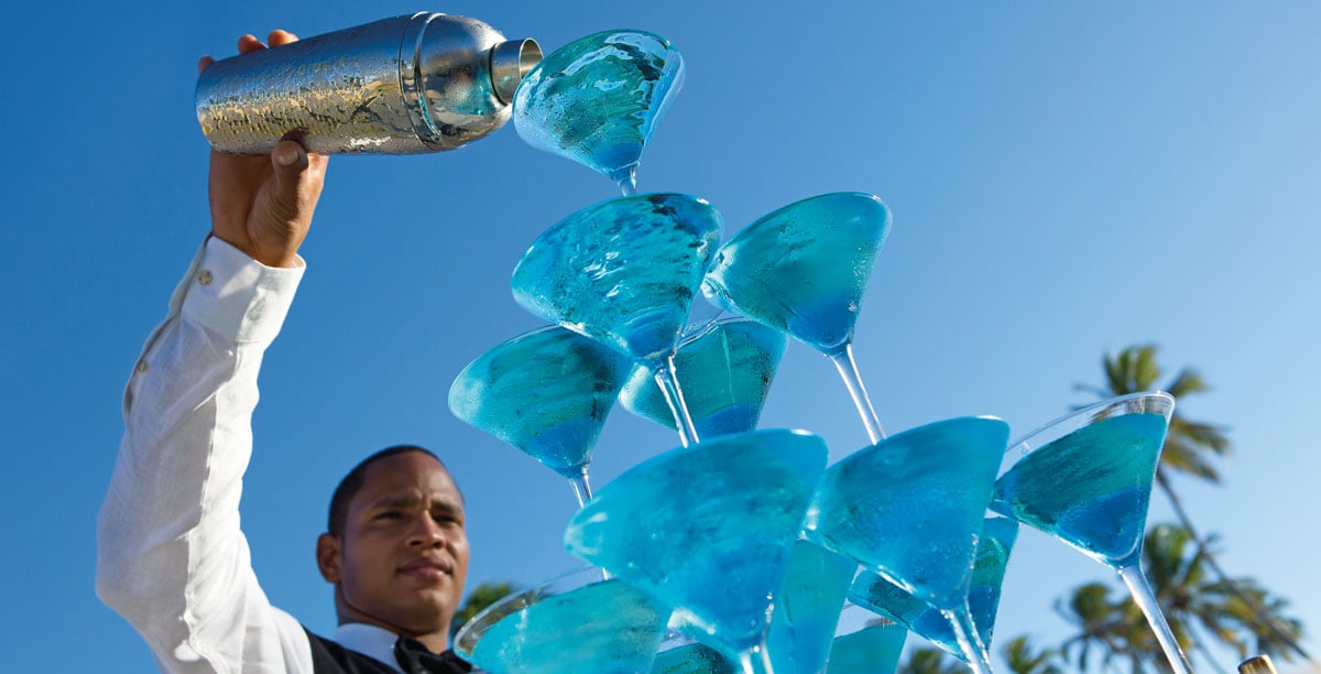 Bartender pouring martini tower