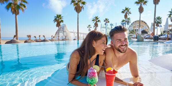 Couple relaxing in pool