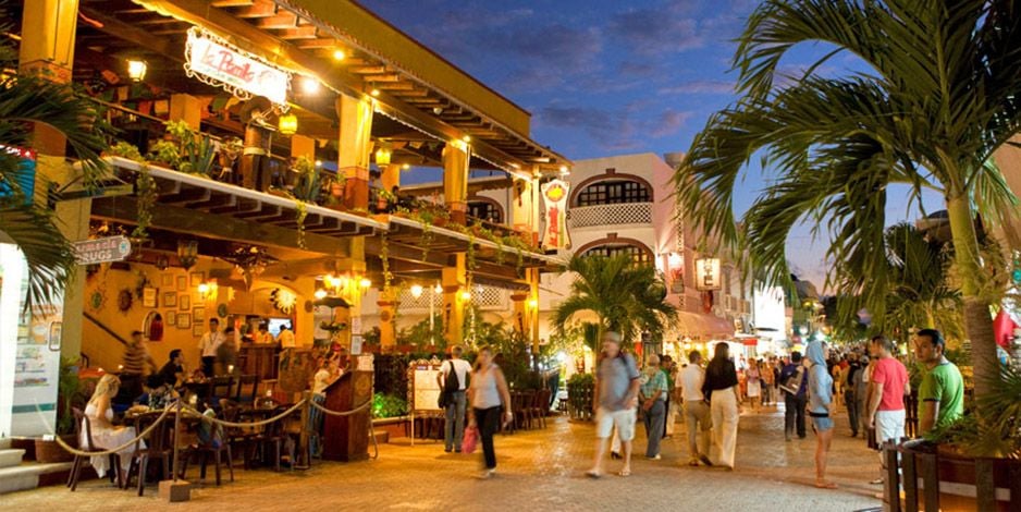 People walking through Riviera Maya